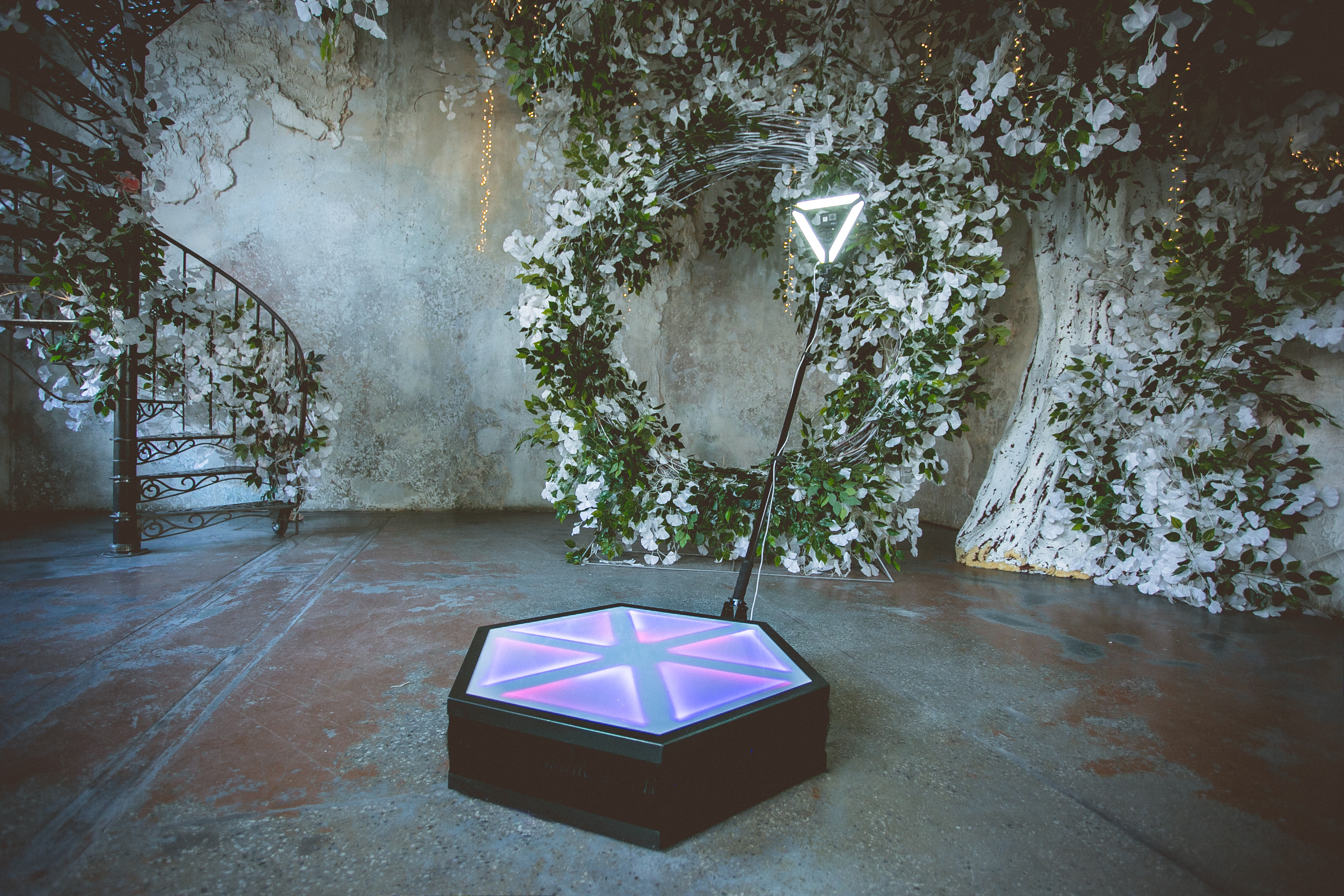 360 photo booth with floral arch