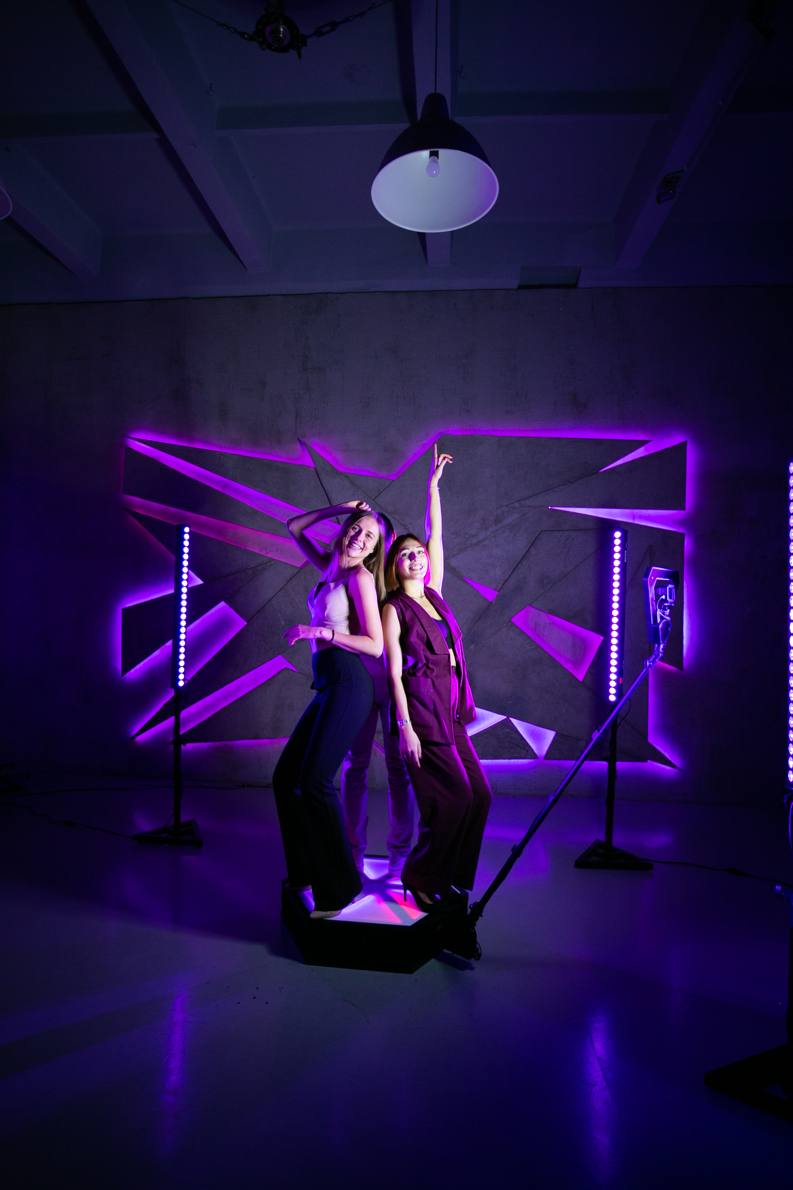 360 photo booth with purple neon lighting